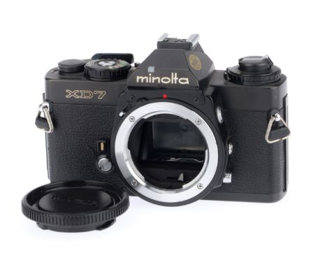 A Minolta XD7 35mm SLR Camera Body, black, serial number 2205366, body VG, with batteries inserted it does not power up, not 