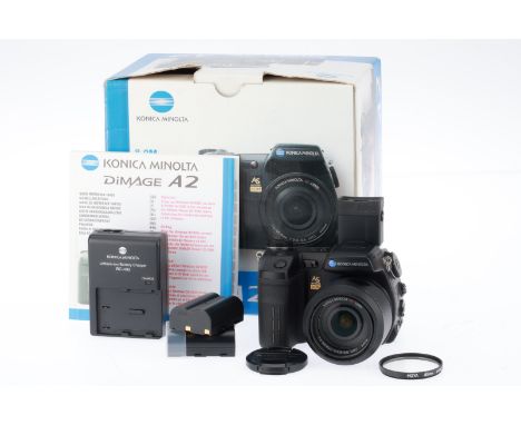 A Konica Minolta Dimage A2 Digital Bridge Camera, black, serial number 32412833, VG-E, powers up, focusses, takes a picture, 
