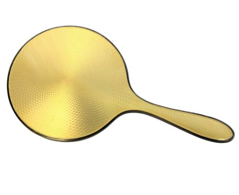 A silver and yellow guilloche enamel hand mirror, Birmingham marks 