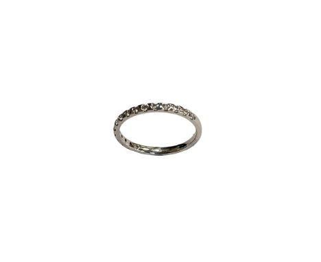 A 9ct white gold diamond half eternity ring, approximately 0.25ct, size L. 