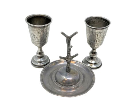 A pair of Edwardian silver goblets and an antique silver ring tree (3) CONDITION REPORT: 74.3g
