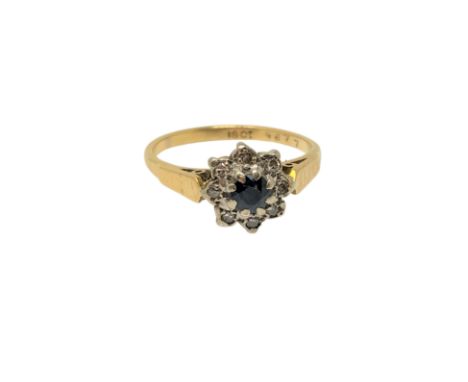 An 18ct gold sapphire and diamond cluster ring, size M CONDITION REPORT: 3.2g