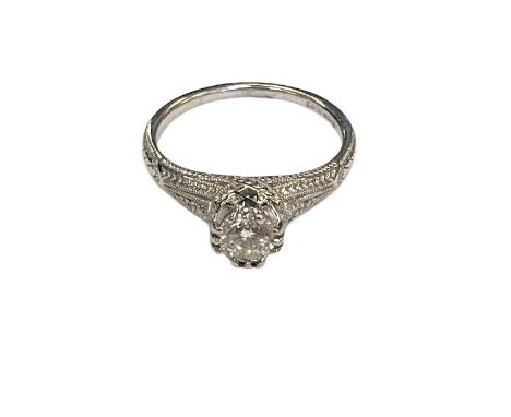 A platinum solitaire diamond ring, approximately 0.5ct, size K/L.