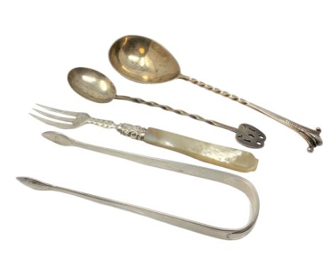 A group of silver cutlery including pair of Georgian tongs, Art Nouveau spoon etc 