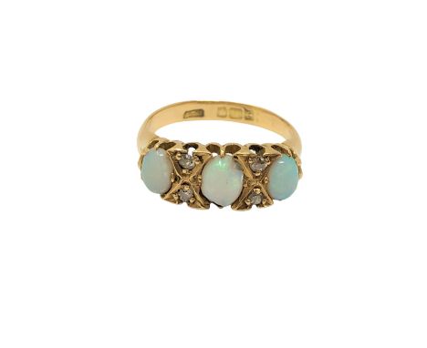 An antique 18ct gold opal and diamond ring, size K CONDITION REPORT: One opal chipped. 