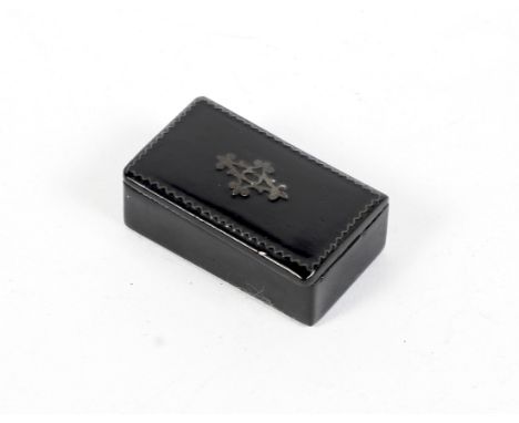 A 19th Century papier-mache snuff box of rectangular form, with white metal inlay to the lid, 3.5cm wide