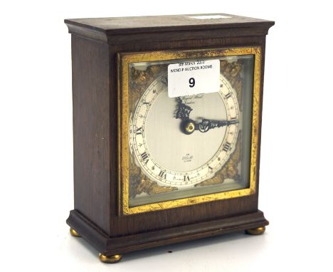 A Garrard &amp; Co Ltd mantle clock, the movement by Elliot London, the silvered dial with Roman numerals and gilt embellishm