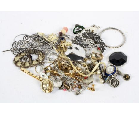 A collection of costume jewellery, including charms, a bangle, bracelets, earrings and more