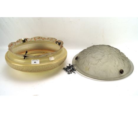 Two vintage glass hanging ceiling light shades, one with moulded floral decoration, largest measuring 36cm diameter