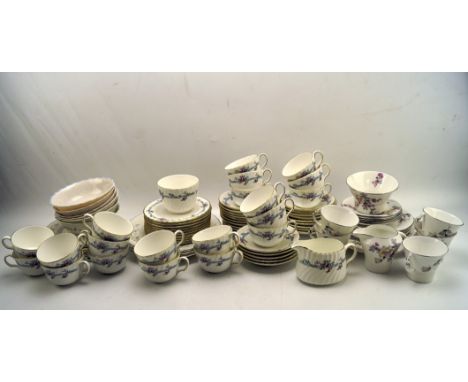 Three 20th century part tea services, including French plates and bowls in a floral pattern, Royal Doulton plates, cups and s