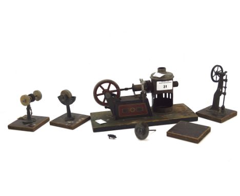 A German Georges Carette steam engine toy, featuring a burner and reel, length 24cm, together with other components, all moun
