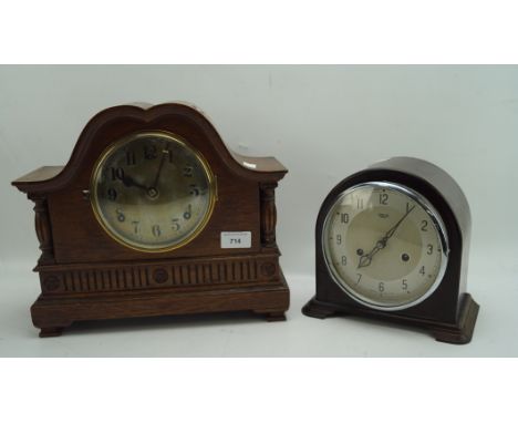 Two vintage mantle clocks, one with silvered face featuring Arabic numerals, marked Smiths Enfield, in a bakelite case, heigh