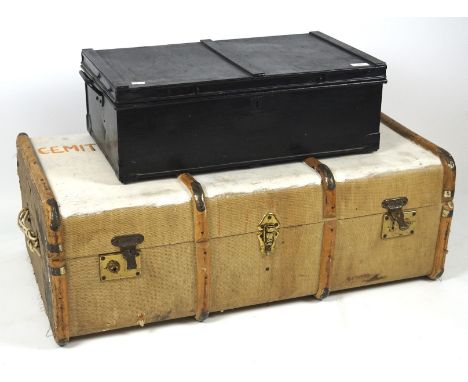 A mid-century canvas trunk and a smaller metal example, the first with wood banding, partly painted white, 32cm x 90cm x 51cm