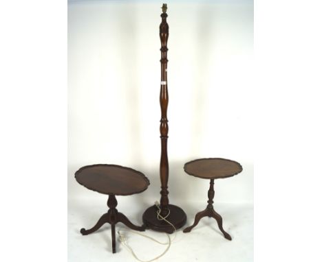 Two mahogany low side tables and a standard lamp, the first with scrolled lip and on cabriole tripod supports, heights 51cm a