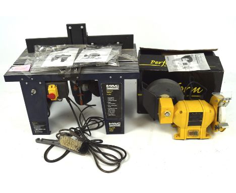 A 'Perform' Grinder and a Mac Allister Router Table Kit, the grinder model CCWSG, in the original box, the Router Kit with th