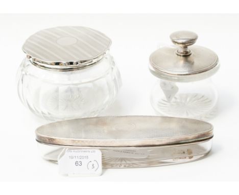 A cut glass dressing table jar, the silver lid decorated with engine turning, Birmingham 1926, 11cm diameter x 8cm high, toge