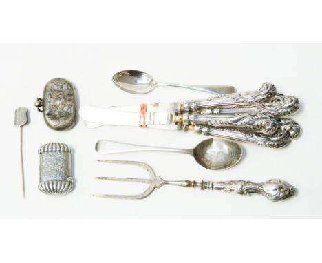 A late Victorian silver vesta case with ornate lobed decoration, Birmingham 1896; together with a silver Sovereign case and a