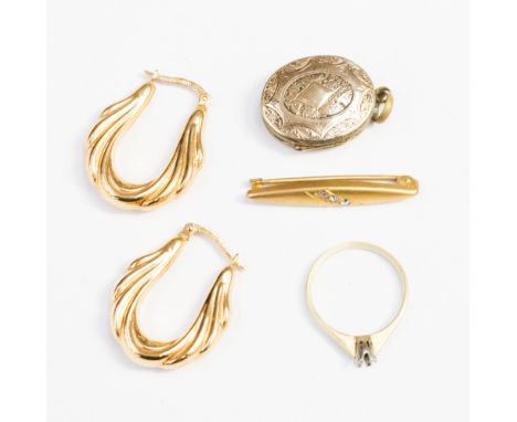 A collection of gold and yellow metal including earrings, locket, ring, etc, 8.6 grams approx 