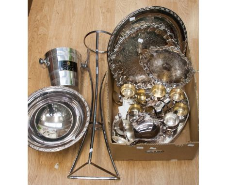 A large quantity of silver plate including punch bowl and cups, two Old Sheffield plate trays, tea service, ice bucket, Coron