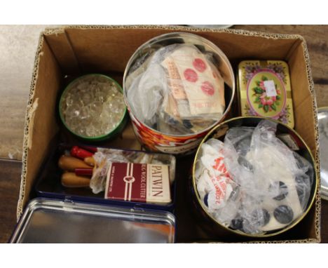 A good selection of buttons in tins from the 40's/50's and 60's and a set of rag wool tools in a tin.