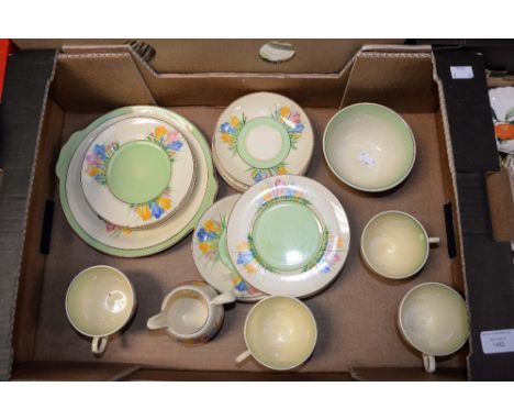 A Clarice Cliff Crocus pattern part tea service, comprising plates, dishes, cups, saucers, etc (21)