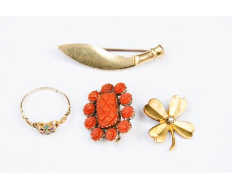 A Victorian red carved coral brooch, together with a dainty ruby, emerald and diamond posy ring - yellow metal, a yellow meta