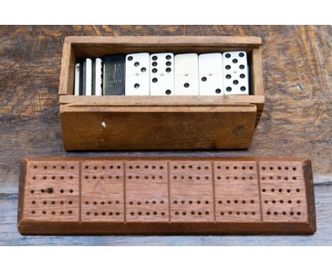  A boxed set of dominoes and a cribbage board, dominoes - Horner Ales