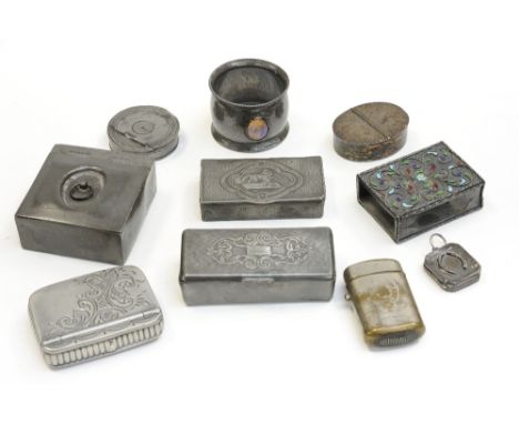 A collection of assorted pewter boxes and miniatures, including an Arts and Crafts cabochon napkin ring, pill box, patch boxe