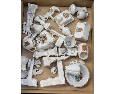 A collection of various Goss crested ware, miniature souvenir ceramics.