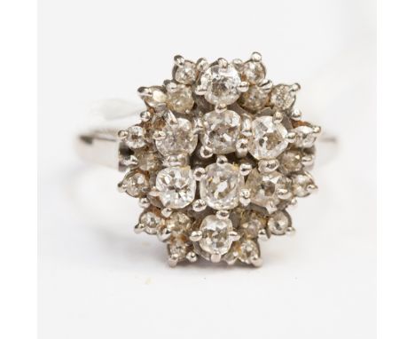 A diamond cluster ring, claw set, numerous graduated old cut diamonds, total weight approximately 1.0ct, approximately 6 gram