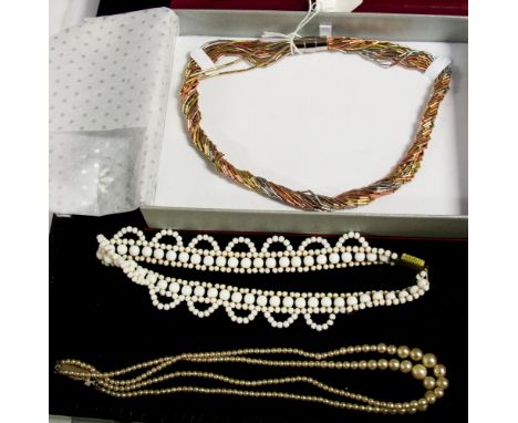 An 'eternal' bugle bead necklace, together with a vintage and double string of simulated pearls. (3)