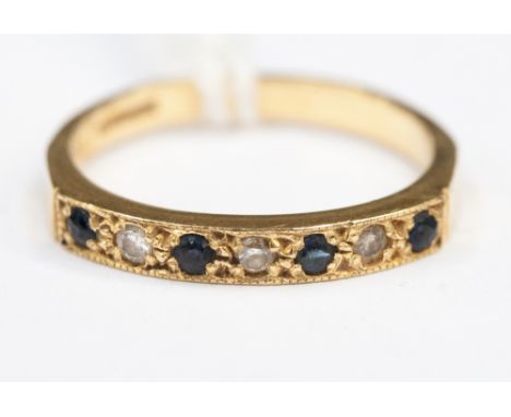 An 18ct gold diamond and sapphire ladies ring, ring size 'K1/2', approx 2.4 grams 