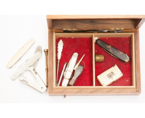 A box of items to include two gold rings, tortoiseshell cased penknife, ivory vesta case, 9ct gold cased propelling pencil, a