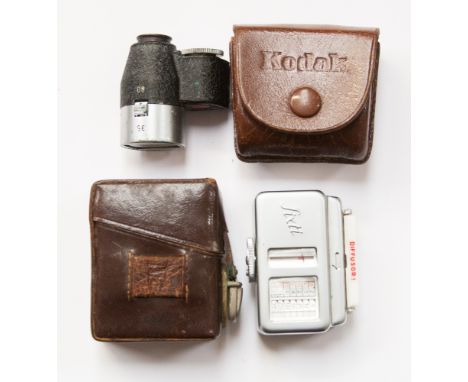 Two camera related items to include a light meter.