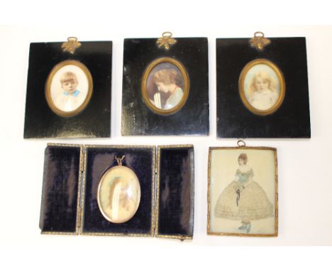 A collection of five Ivory portrait miniatures, including a yellow metal framed examples (5) 