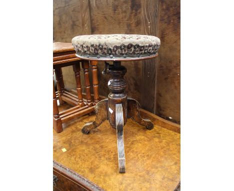 A 19th century American Tonks piano stool.