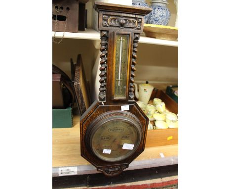 A 1930s changeable barometer in oak case, along with three pictures 