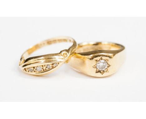 An 18ct gold five stone diamond ring, set four rose-cut diamonds (one missing) and a 9ct gypsy set solitaire diamond ring, th