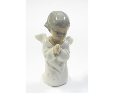 A Lladro kneeling praying Angel 