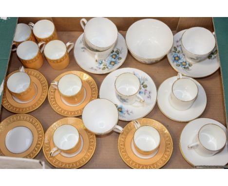 A Minton coffee set No. 'H5170' comprising eight cups and five saucers, with gold decoration on a yellow ground; together wit