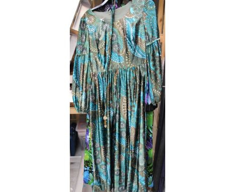 Three ladies evening dresses in immaculate condition - one in a jade/turquoise print with a paste stone belt decoration - one