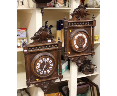 A late 19th Century French wall clock columns side and crested top with matching barometer  