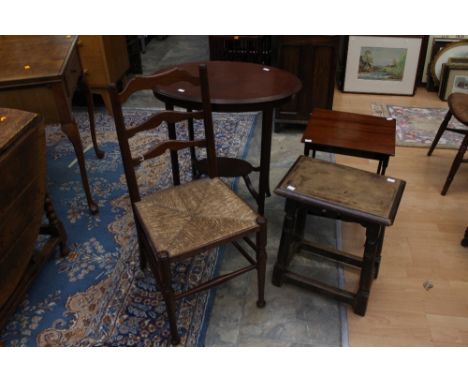 A collection of furniture comprising rush seated ladder back chair, a two tier occasional table, an oak stool and a small tab