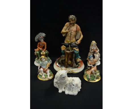 A ceramic figure of a blacksmith along with another five 