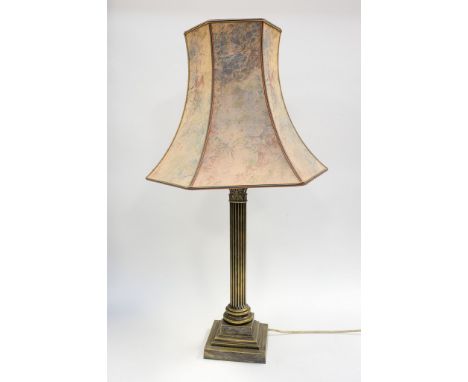 A brass table lamp
