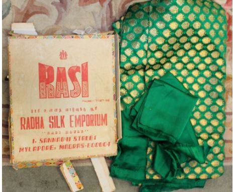 A Sari in original box bought in Madras in the late 60's/early 70's (as new), jade green silk under gold leaf pattern and jad