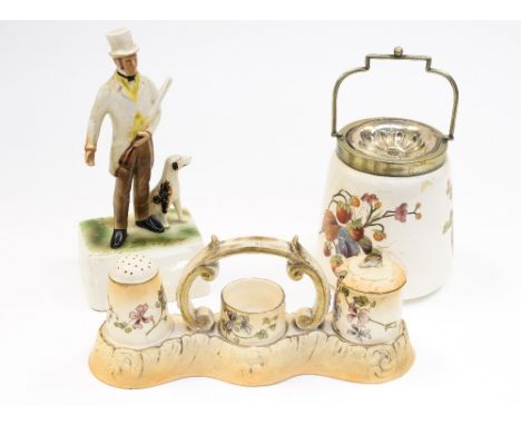A late 19th Century ceramic cruet set, Royal Pottery Burslem (1894) together with a late 19th/early 20th Century figure group