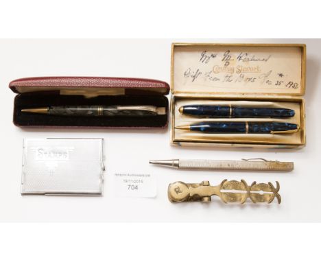 A boxed 1950's Conway Stewart 'Dinkie' 550 14ct gold nibbed fountain pen and matching propelling pencil, a 'Yard O'Lead' boxe