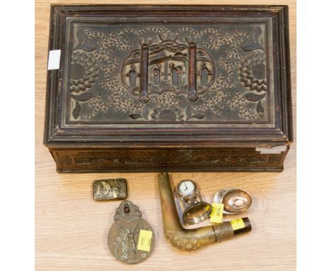 A carved and stained oriental wooden box, together with a Japanese brass embossed vesta case, a silver plated 'Jockey Cap' ca
