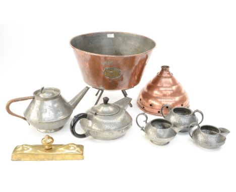 An Arts and Crafts pewter hand hammered five piece tea service; together with a copper bowl on stand, etc 